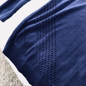Royal blue sweater with funky cut-out detailing